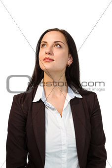 Pretty businesswoman looking up
