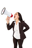 Pretty businesswoman shouting with megaphone