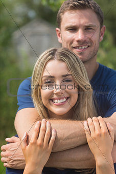 Cute couple smiling at camera