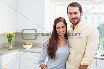 Young couple smiling at the camera