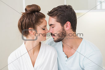 Young couple touching their noses