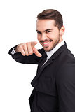 Happy businessman pointing his finger