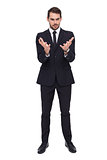 Elegant businessman in suit gesturing