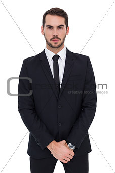 Portrait of a businessman with his hands joined