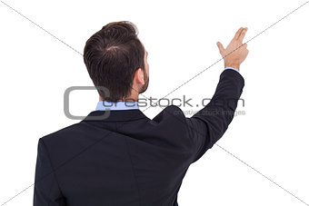 Businessman in suit  pointing these fingers