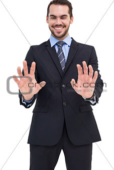 Happy businessman presenting his hands