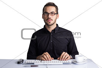 Focused businessman typing on keyboard