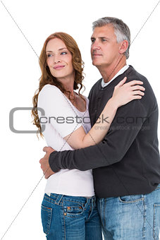Casual couple hugging and smiling