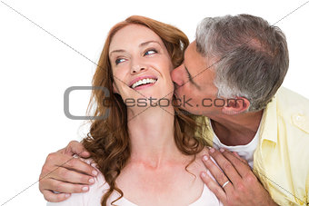Man giving his partner a kiss