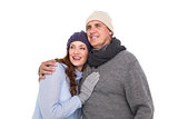 Couple in warm clothing embracing