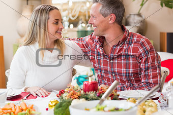 Cute couple smiling at each other
