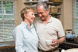 Senior couple having coffee together