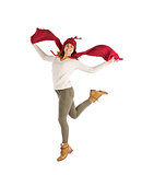 Happy brunette jumping and holding his scarf