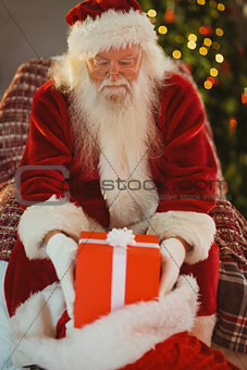 Portrait of santa stocking gifts in his sack
