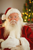 Portrait of cheerful santa with his glasses