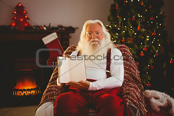 Santa claus showing his book