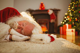Santa claus resting on the rug