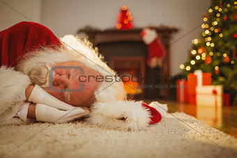 Santa claus resting on the rug