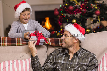 Father giving his son a christmas present