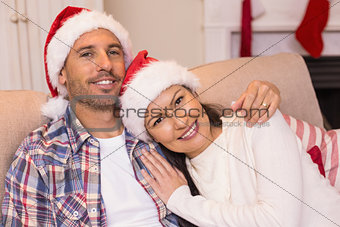 Love couple hugging on the couch