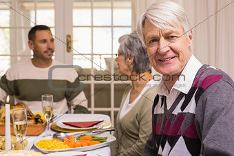 Portrait of a grandfather during christmas dinner