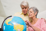 Senior couple choosing a travel destination
