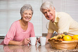 Senior couple having coffee together