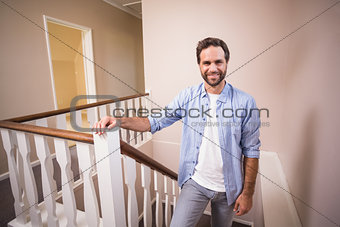 Casual man walking up the stairs