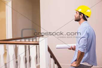 Casual architect walking up the stairs
