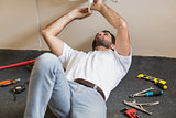 Plumber fixing the sink in a bathroom