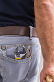 Handyman with tools in back pocket