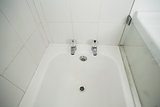 Overhead of white bath tub
