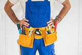 Handyman standing in tool belt