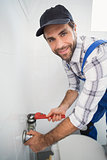 Plumber fixing tap with wrench