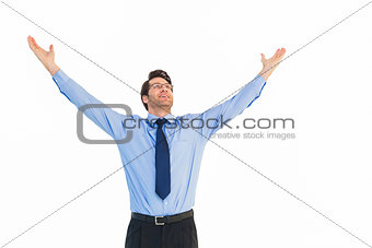 Cheering businessman with his arms raised up