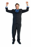 Portrait of a cheerful businessman with clenched fists