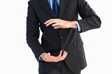 Mid section of a businessman presenting with his hands