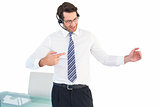Businessman using a headset while presenting something