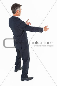 Happy businessman with arms out