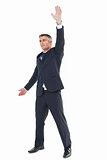 Smiling businessman doing a gesture