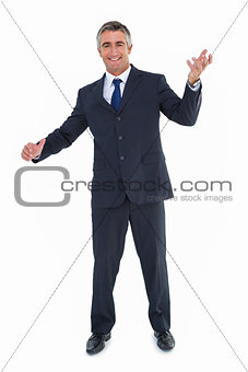 Cheerful businessman with arms out