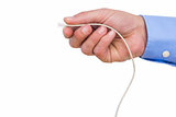 Hand of a businessman connecting a cable