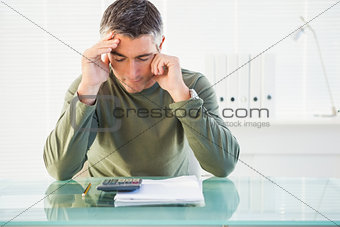 Concentrated man analyzing account