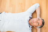 Man lying and relaxing on the floor