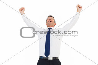Excited businessman with glasses cheering