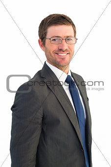Handsome businessman smiling at camera
