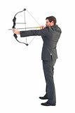 Businessman shooting a bow and arrow