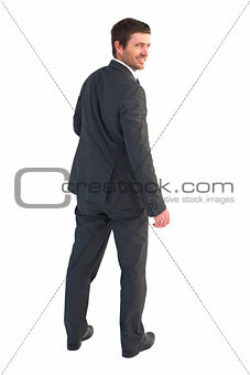 Businessman standing and smiling
