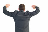 Businessman standing with hands up