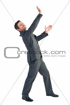 Businessman with his hands up